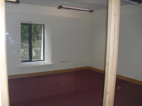 Suite Three, seen through its glass-panelled front wall
