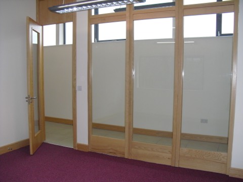 Suite Four: oak-framed glazed partition and door