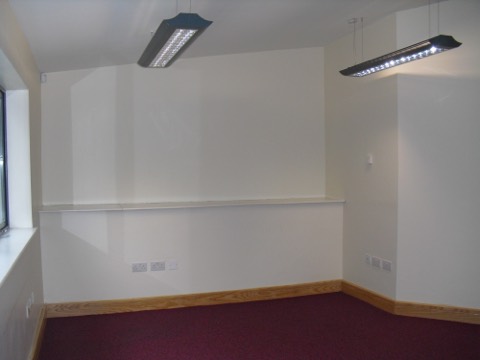 Suite Seven under its twin pendant light bars